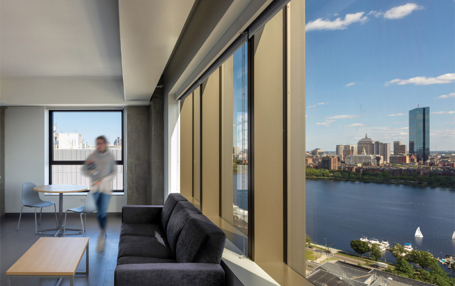 An MIT residence with windows overlooking the Charles River